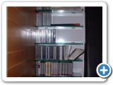 CD RACK NEAR BED
